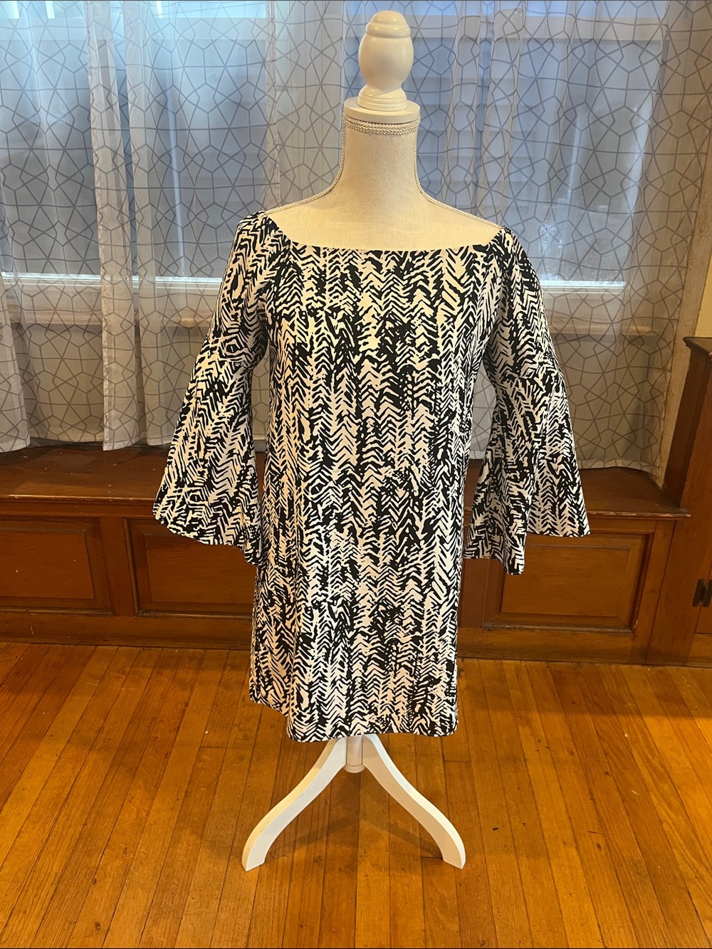 Off-Shoulder Black and White Patterned Mini Dress with Bell Sleeves